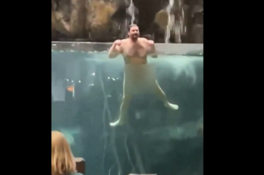 Videó: meztelenül berontott a horgászboltba, majd fejest ugrott az akváriumba